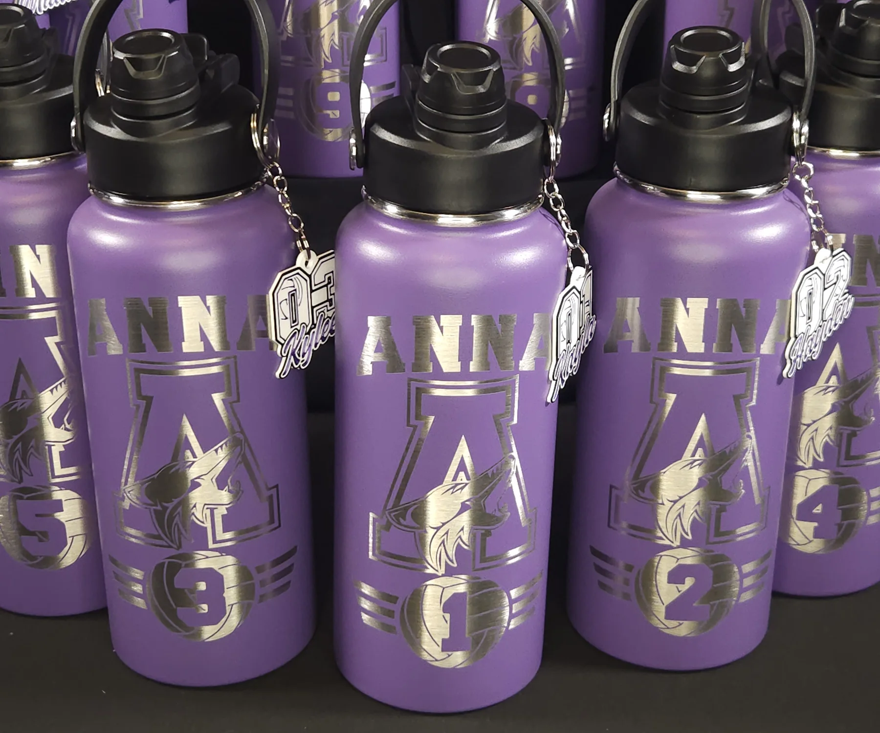 Group of personalized team water bottles
